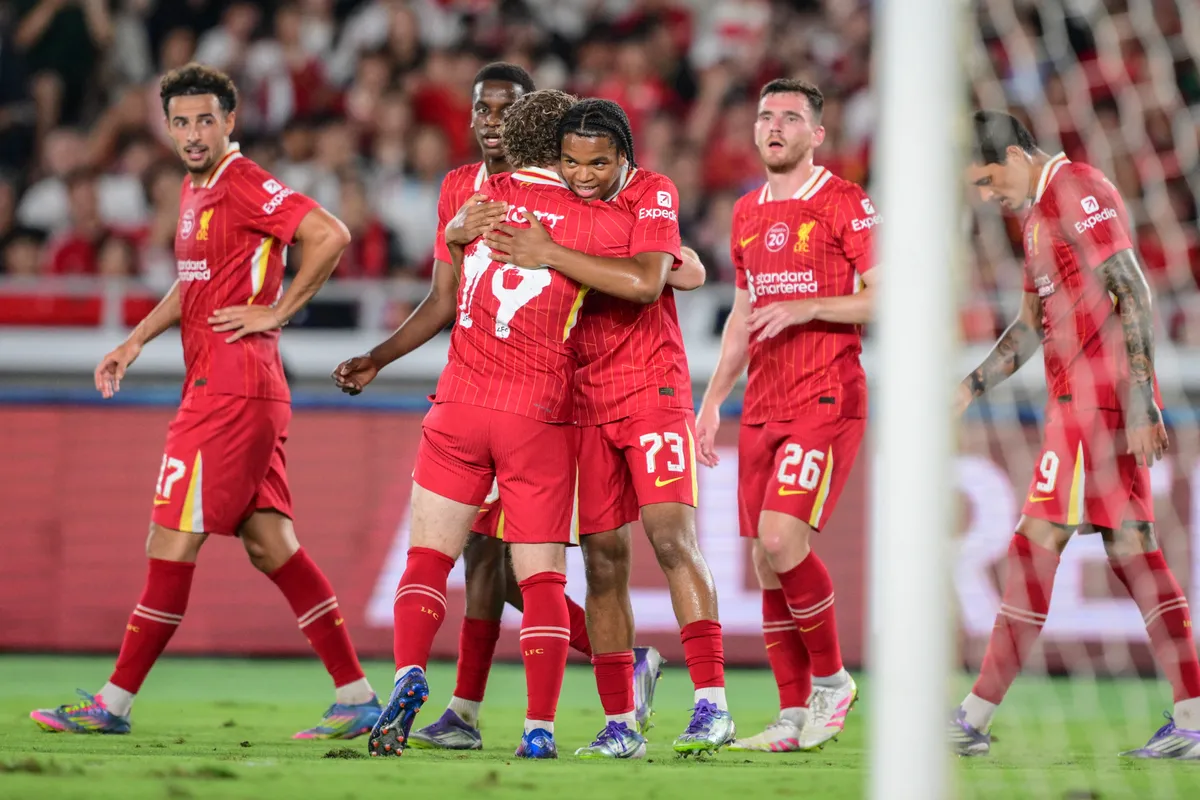 Liverpool's Rio Ngumoha (C) celebrates with his teammates after scoring a goal during the friendly football match between English Premier League side Liverpool and Japan's J-League team Yokohama F. Marinos in Yokohama on July 30, 2025. (Photo by Yuichi YAMAZAKI / AFP)