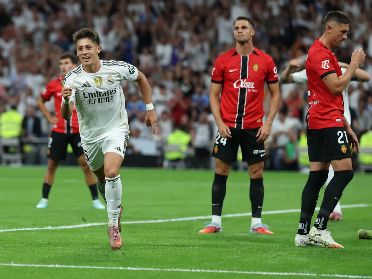 Real Madrid's Turkish midfielder #15 Arda Guler celebrates a goal that was later annulled during the Spanish league football match between Real Madrid CF and Real RCD Mallorca at the Santiago Bernabeu stadium in Madrid on August 30, 2025. (Photo by Thomas COEX / AFP)