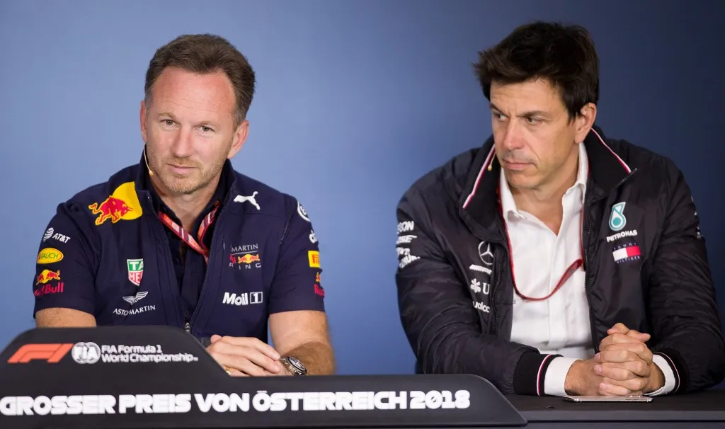 Christian Horner (Team Principal Red Bull Racing, L) and Toto Wolff, Team Principal & CEO Mercedes AMG F1 Petronas attend a press conference at the Red Bull Ring in Spielberg on June 29, 2018, ahead of the Austrian Formula One Grand Prix. (Photo by GEORG HOCHMUTH / APA / AFP) / Austria OUT