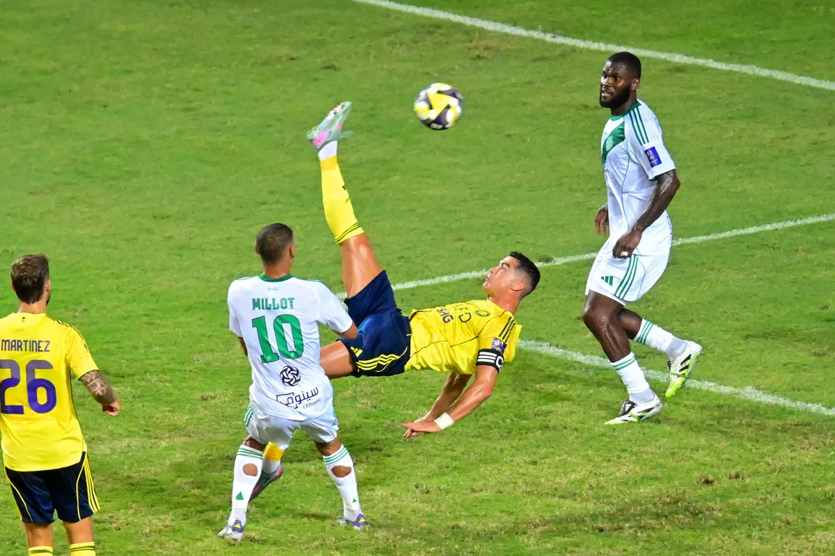 (250823) -- HONG KONG, Aug. 23, 2025 (Xinhua) -- Cristiano Ronaldo (2nd R) of Al-Nassr competes during the Saudi Super Cup final football match between Al-Nassr and Al-Ahli in Hong Kong, China, Aug. 23, 2025. (Xinhua/Zhu Wei) (Photo by Zhu Wei / Xinhua via AFP)