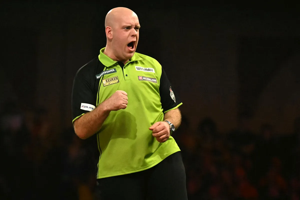 Netherlands' Michael van Gerwen reacts while against England's Luke Littler during the PDC World Darts Championship final, at Alexandra Palace in London on January 3, 2025. (Photo by Ben STANSALL / AFP)