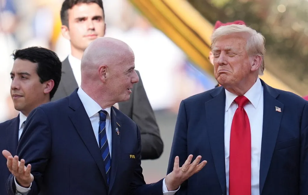 NEW JERSEY, UNITED STATES - JULY 13: President of the United States Donald Trump and FIFA President Gianni Infantino present medals to the players following the FIFA Club World Cup 2025 Final match between PSG and Chelsea at MetLife Stadium on July 13, 2025, in New Jersey. Selcuk Acar / Anadolu (Photo by Selcuk Acar / Anadolu via AFP)