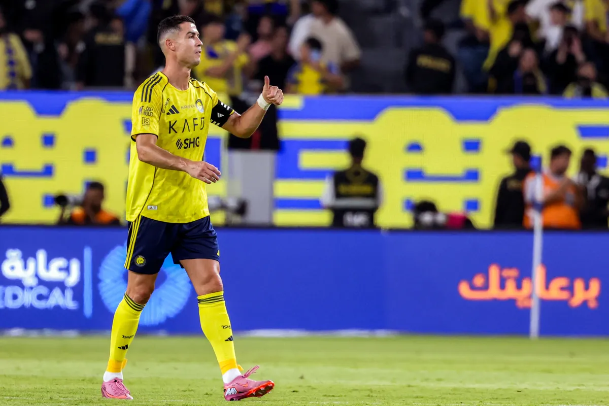 Nassr's Portuguese forward #07 Cristiano Ronaldo celebrates after scoring a goal during the Saudi Pro League football match between Al-Nassr and Al-Riyadh SC at Al-Awwal Park in Riyadh on September 20, 2025. (Photo by Fayez NURELDINE / AFP)
