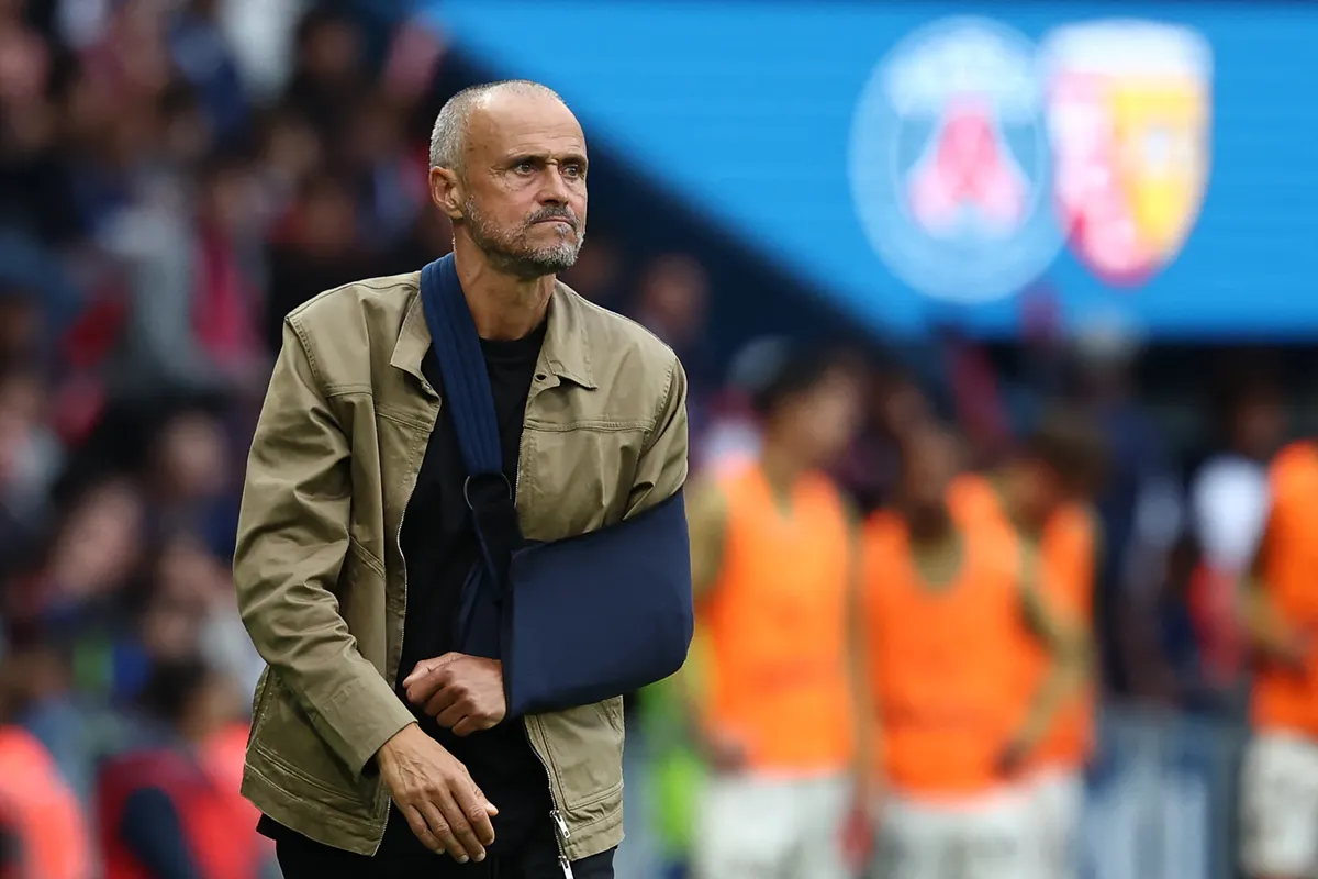 Paris Saint-Germain's Spanish headcoach Luis Enrique reacts during the French L1 football match between Paris Saint-Germain (PSG) and RC Lens at the Parc des Princes stadium in Paris, on September 14, 2025. (Photo by FRANCK FIFE / AFP)