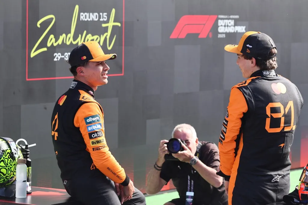 Lando Norris and Oscar Piastri of McLaren after qualifying ahead of the Formula 1 Grand Prix of The Netherlands at Circuit Zandvoort in Zandvoort, Netherlands on August 30, 2025. (Photo by Jakub Porzycki/NurPhoto) (Photo by Jakub Porzycki / NurPhoto via AFP)
