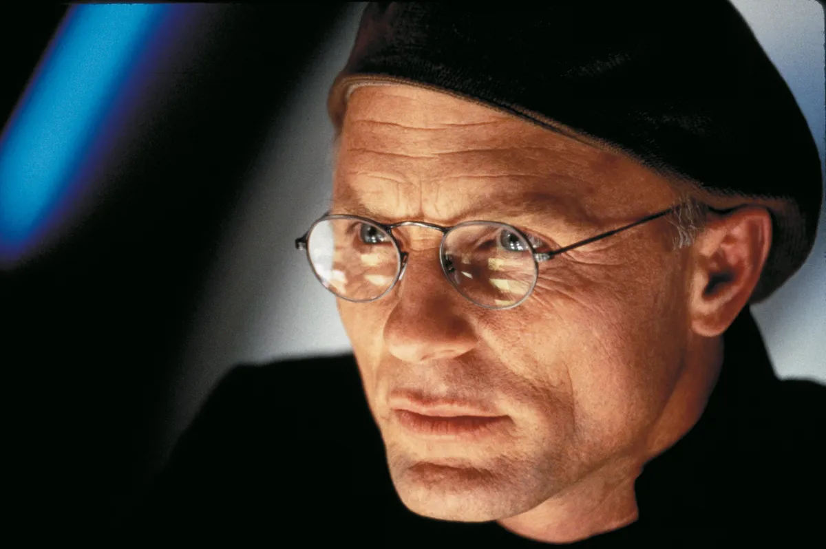 Yellowstone 1998; The Truman Show. Original Film Title: The Truman Show, PICTURED: ED HARRIS, Composer: Philip Glass, Director: Peter Weir, IN CAST: Jim Carrey, Ed Harris, Laura Linney, Natascha Mcelhone, Noah Emmerich, Michael Rapaport