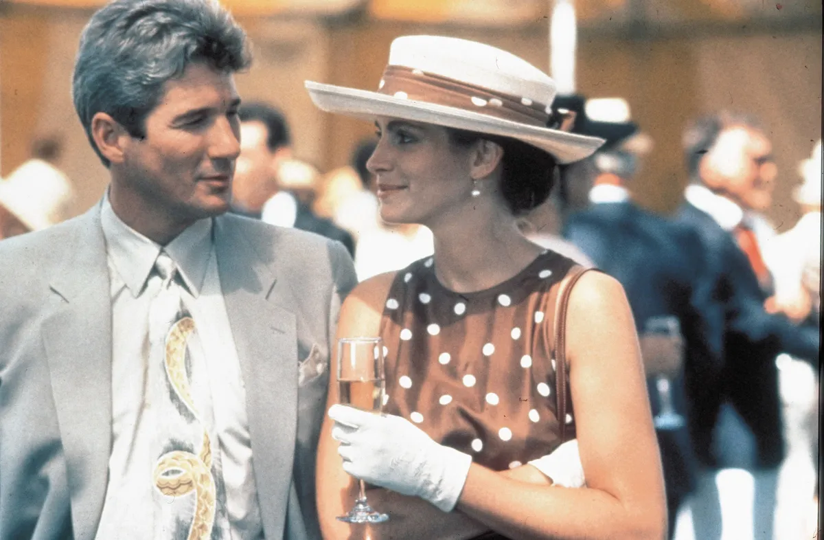 1990; Pretty Woman. Original Film Title: Pretty Woman, PICTURED: RICHARD GERE, JULIA ROBERTS, Composer: James Newton Howard, Director: Garry Marshall, IN CAST: Laura San Giacomo, Hector Elizondo, Julia Roberts, Richard Gere, Ralph Bellamy, Jason Alexander, Alex Hyde-White, Elinor Donahue, Larry Miller, Jane Morris Mandatory Credit: Photo by TOUCHSTONE/ZUMA Press. (©) Copyright 1990 by TOUCHSTONE.