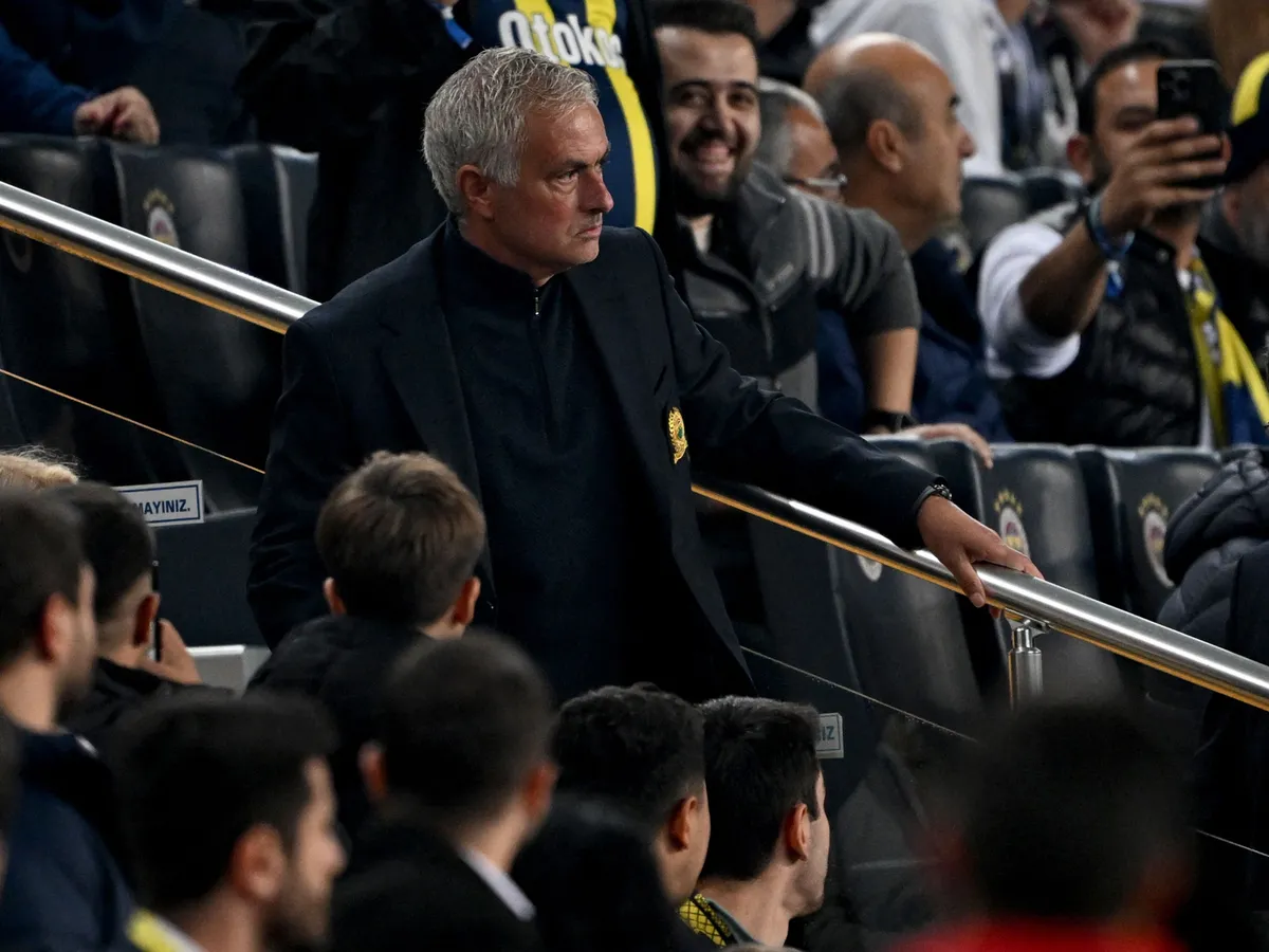 Fenerbahce's Portuguese coach Jose Mourinho watches the match from the stand after receiving a red card during the UEFA Europa League, 1st round day 3 football match between Fenerbahce SK and Manchester United at the Sukru Saracoglu Stadium in Istanbul on October 24, 2024. (Photo by Ozan KOSE / AFP)