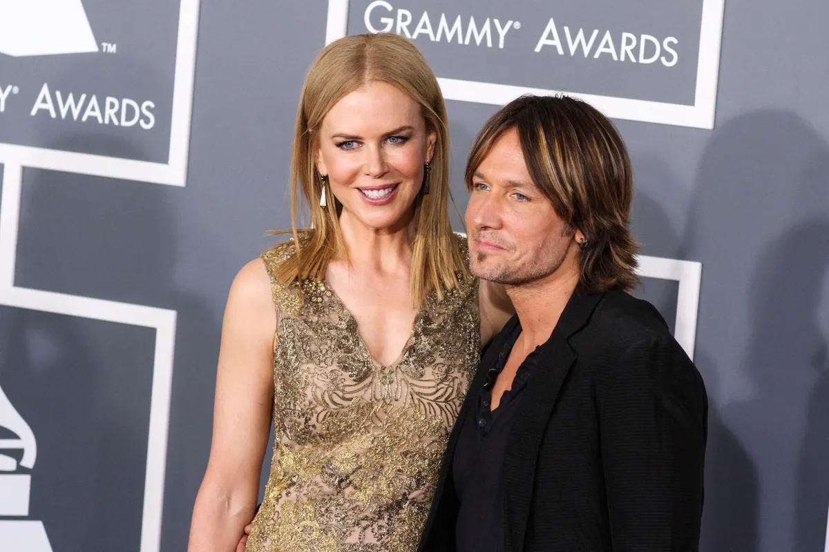 (FILE) Nicole Kidman and Keith Urban split after 19 years of marriage on Monday, September 29, 2025. LOS ANGELES, CALIFORNIA, USA - FEBRUARY 10: Australian-American actress and producer Nicole Kidman and husband/Australian-American country music singer, guitarist, and songwriter Keith Urban arrive at the 55th Annual GRAMMY Awards held at Staples Center on February 10, 2013 in Los Angeles, California, United States. (Photo by Xavier Collin/Image Press Agency/NurPhoto) (Photo by Image Press Agency / NurPhoto via AFP)