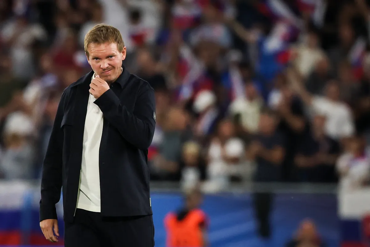 04 September 2025, Slovakia, Bratislava: Soccer: World Cup Qualification Europe, Slovakia - Germany, Group Phase, Group A, Matchday 1, Narodny Futbalovy Stadion, Germany coach Julian Nagelsmann (Germany) on the pitch after the match. Photo: Christian Charisius/dpa (Photo by CHRISTIAN CHARISIUS / dpa Picture-Alliance via AFP)