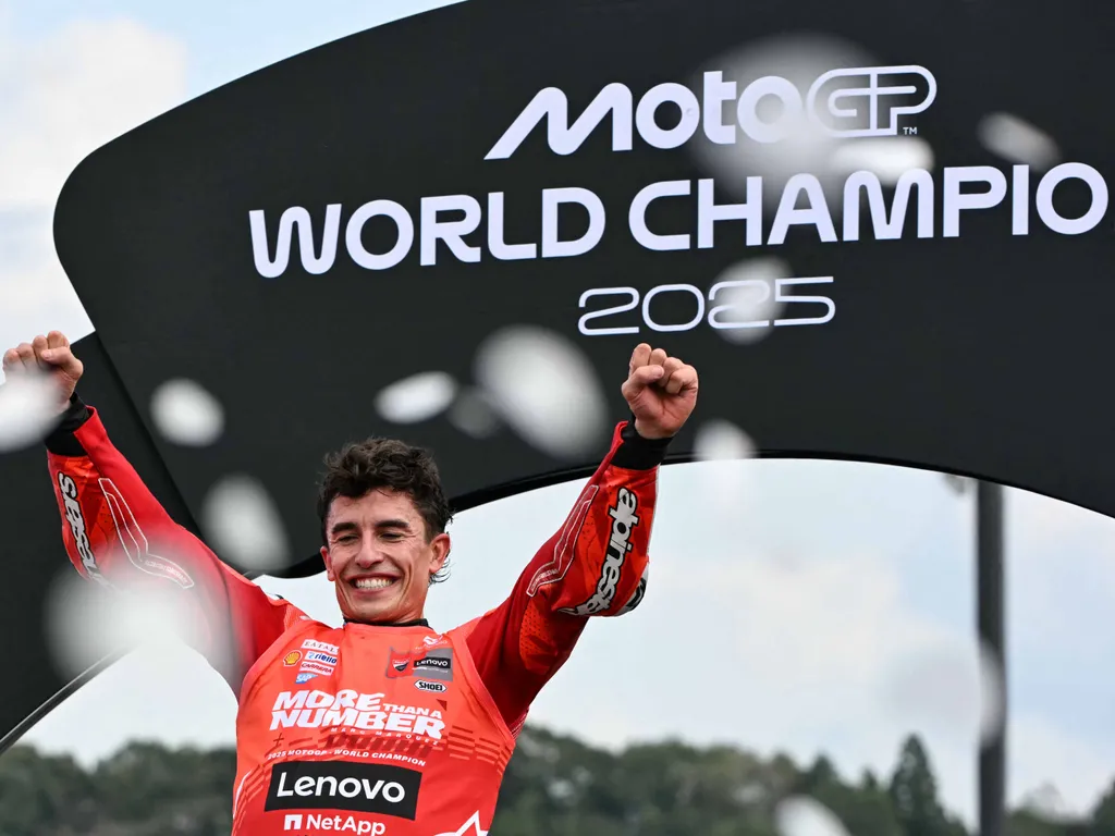 MarcMárquez, MarcMárquezgyorsaságimotorversenyző, Marc Márquez gyorsasági motorversenyző, Marc Márquez Ducati Lenovo Team's Spanish MotoGP rider Marc Marquez celebrates on the podium after the MotoGP class race of the MotoGP Japanese Grand Prix at the M