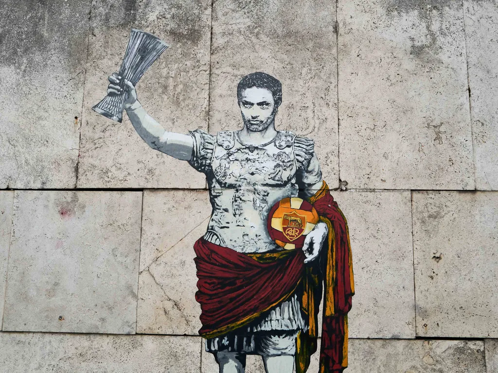JoséMourinho, JoséMourinhokarrier, José Mourinho, José Mourinho karrier, This photograph taken on May 26, 2022 shows a painting of artist Harry Greb, depicting Roma's Portuguese head coach Jose Mourinho, who led the team to the victory in UEFA Europa Con