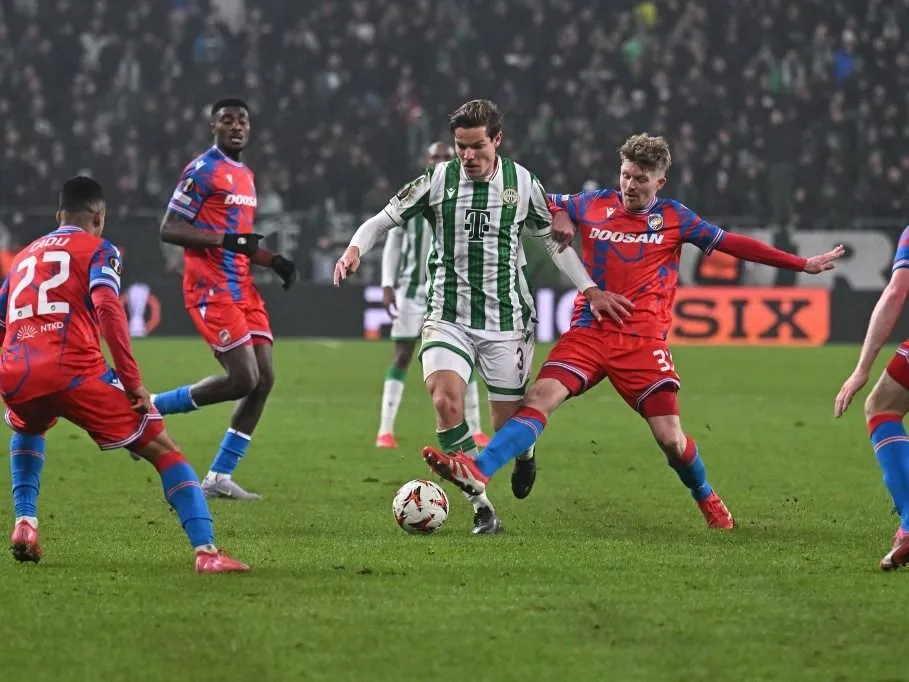 Ferencvaros' Danish defender #03 Stefan Gartenmann vies for the ball during the UEFA Europa League knockout round play-off first leg football match between Ferencvarosi TC and FC Viktoria Plzen in Budapest on February 13, 2025. (Photo by Attila KISBENEDEK / AFP)
