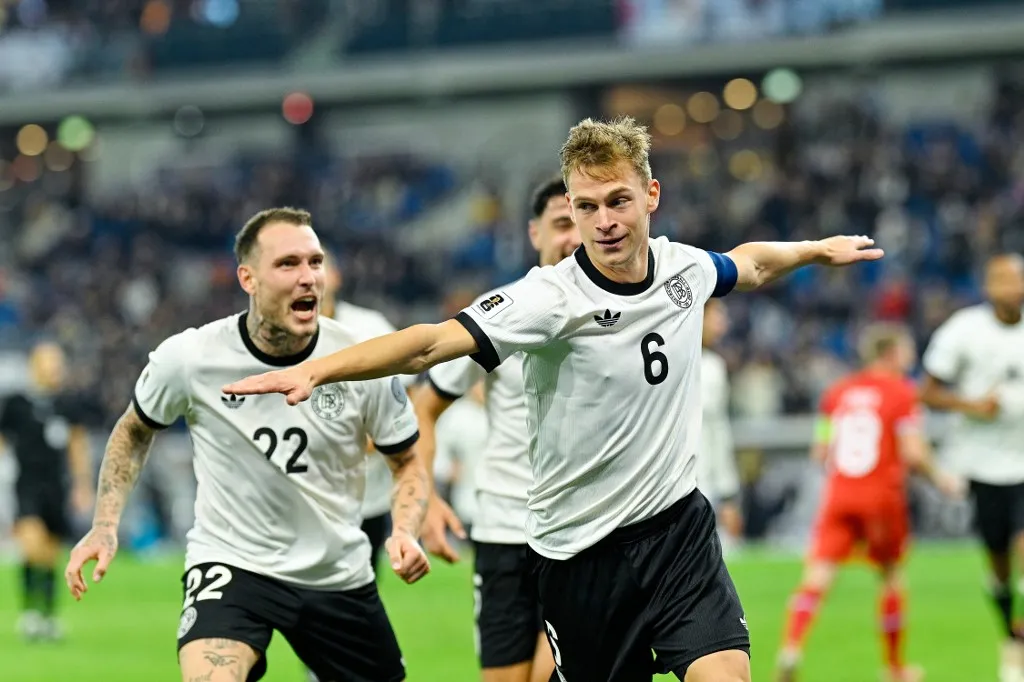 10 October 2025, Baden-Württemberg, Sinsheim: Soccer: World Cup Qualification Europe, Germany - Luxembourg, Group Phase, Group A, Matchday 3, PreZero Arena, Joshua Kimmich (Germany) celebrates the 4:0 goal next to David Raum (l). Photo: Uwe Anspach/dpa (Photo by UWE ANSPACH / dpa Picture-Alliance via AFP)