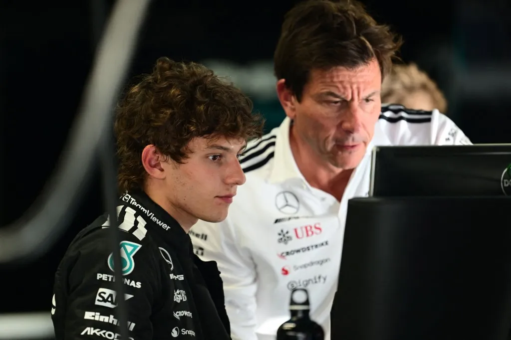 Andrea Kimi Antonelli and Toto Wolff of the Mercedes-AMG Petronas F1 Team speak during the qualifying of the Italian GP, the 16th round of the Formula 1 World Championship, at Autodromo Nazionale di Monza in Monza, Lombardy, Italy, on September 6, 2025. (Photo by Andrea Diodato/NurPhoto) (Photo by Andrea Diodato / NurPhoto via AFP)