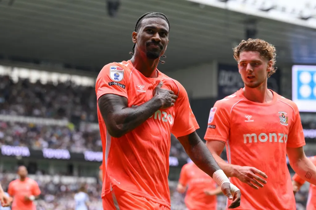 Haji Wright of Coventry City celebrates after scoring a goal to make it 1-2 in the Sky Bet Championship match between Derby County and Coventry City at Pride Park in Derby, England, on August 16, 2025. (Photo by Jon Hobley/MI News/NurPhoto) (Photo by MI News / NurPhoto via AFP)