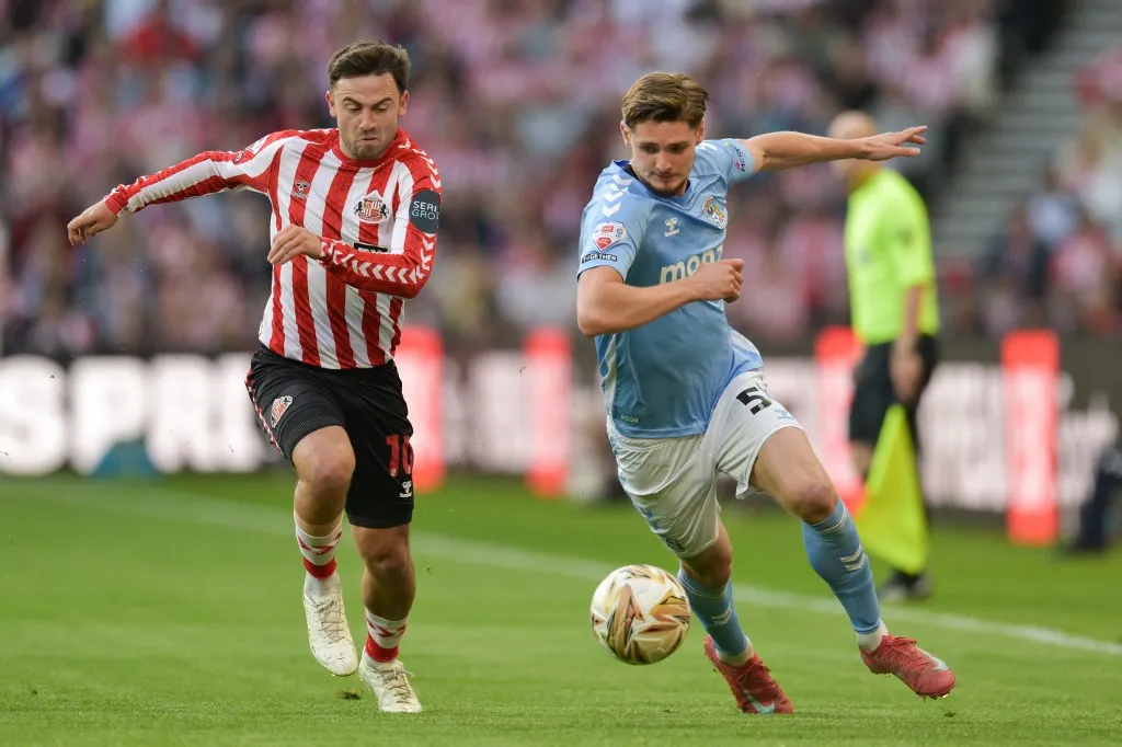 Coventry City's Jack Rudoni and Sunderland's Patrick Roberts participate in the Sky Bet Championship Play Off Semi Final Second Leg match between Sunderland and Coventry City at the Stadium Of Light in Sunderland, England, on May 13, 2025. (Photo by Scott Llewellyn | MI News/NurPhoto) (Photo by MI News / NurPhoto via AFP)