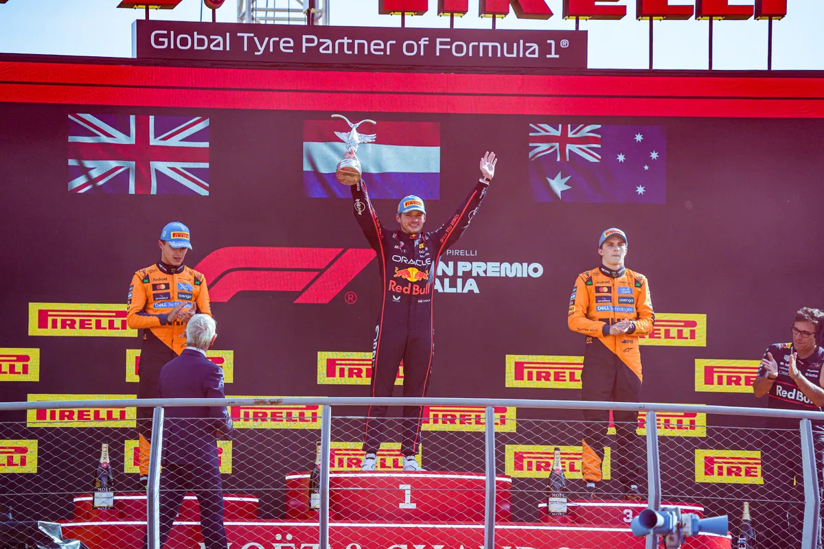 Max Verstappen, Lando Norris, and Oscar Piastri (both McLaren)stand on the podium at Autodromo Nazionale di Monza in Monza, Italy, on September 7, 2025, during the free practice of the Formula 1 Pirelli Gran Premio d'Italia 2025 (Photo by Alessio Morgese/NurPhoto). (Photo by Alessio Morgese / NurPhoto via AFP)
