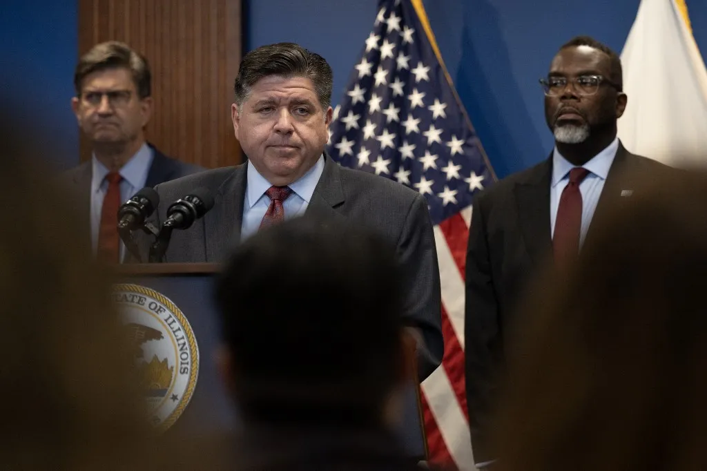 CHICAGO, ILLINOIS - OCTOBER 06: Illinois Gov. JB Pritzker speaks at a news conference October 06, 2025 in Chicago, Illinois. Pritzker, Chicago Mayor Brandon Johnson and other political leaders addressed President Donald Trump's threat to deploy the National Guard to the city. Pritzker accused the president of using the troops as political props and of trying to incite violence in the city for political gain. Scott Olson/Getty Images/AFP (Photo by SCOTT OLSON / GETTY IMAGES NORTH AMERICA / Getty Images via AFP)