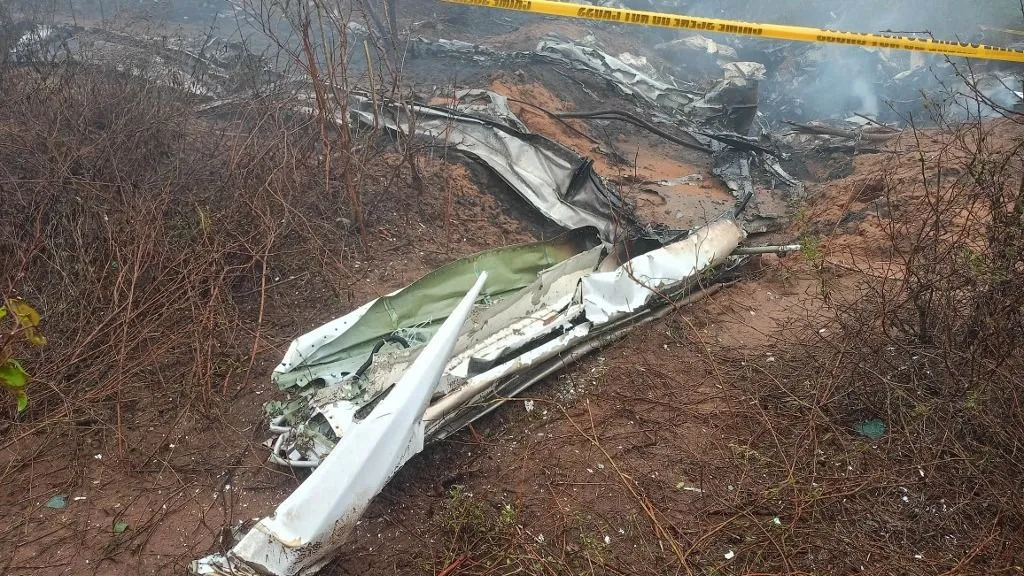 NAIROBI, KENYA - OCTOBER 28: Wreckage of a plane bound for the Maasai Mara is seen in the area after it crashed near Tsimba, south of Nairobi, capital of Kenya, on October 28, 2025. Eleven people, including tourists, were killed Tuesday morning when a light aircraft crashed in the Tsimba area of ​​Kwale County, about 500 kilometers (310 miles) south of the Kenyan capital Nairobi. Emergency responders and aviation researchers have cordoned off the scene as they work to recover remains, secure vital flight data, and investigate the cause of the crash. Officials are still cross-checking the manifest as part of ongoing identification procedures. Rob Diba Liban / Anadolu (Photo by Rob Diba Liban / Anadolu via AFP)