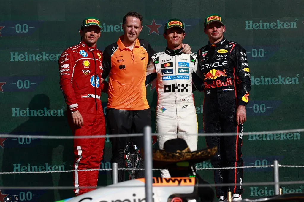 MEXICO CITY, MEXICO - OCTOBER 26: (L-R) Second placed Charles Leclerc of Ferrari, Andrew Jarvis, race winner Lando Norris of McLaren and third placed Max Verstappen of Red Bull take part in the podium ceremony during the F1 Grand Prix of Mexico, at Autodromo Hermanos Rodriguez, in Mexico City, Mexico on October 26, 2025. Daniel Cardenas / Anadolu (Photo by Daniel Cardenas / Anadolu via AFP)