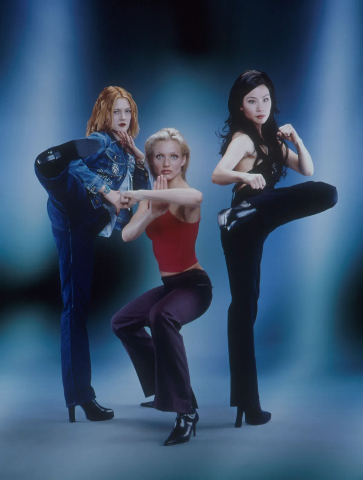 Jan 01, 2000; Hollywood, California, USA; (L-R) Actors DREW BARRYMORE as Dylan, CAMERON DIAZ as Natalie & LUCY LIU as Alex in the action movie 'Charlie's Angels' directed by McG. Mandatory Credit: Photo by D.Michaels/Columbia Pictures/Entertainment Pictures. (©) Copyright 2000 by Courtesy of Columbia Pictures