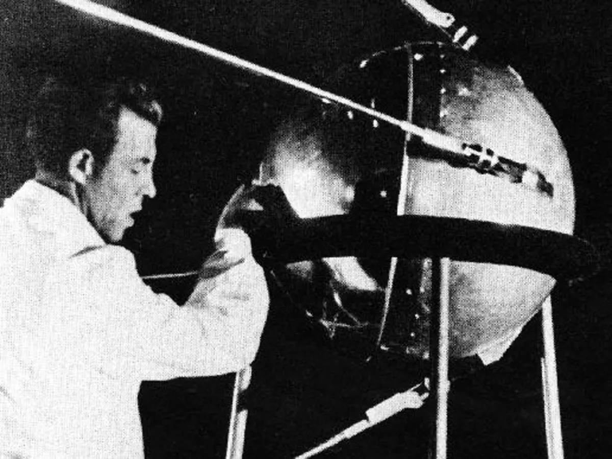 This October 1957 NASA image shows a technician putting the finishing touches on Sputnik 1, humanity's first artificial satellite. The pressurized sphere made of aluminum alloy had five primary scientific objectives, test the method of placing an artificial satellite into Earth orbit; provide information on the density of the atmosphere by calculating its lifetime in orbit; test radio and optical methods of orbital tracking; determine the effects of radio wave propagation though the atmosphere; and, check principles of pressurization used on the satellites. The Soviet Union did not immediately grasp the importance of its Sputnik satellite after launching it 50 years ago, triggering a space race with the United States, said the son of then USSR leader Nikita Khrushchev."The consequences became clear much later. At the time it was like sending a ball far away," Sergei Krushchev, an expert on Russia at Brown University in Rhode Island, told a forum on the 50th anniversary of the Sputnik's launch on 02 October 2007. AFP PHOTO/NASA/HO =GETTY OUT= (Photo by ASIF A. SIDDIQI / NASA / AFP)