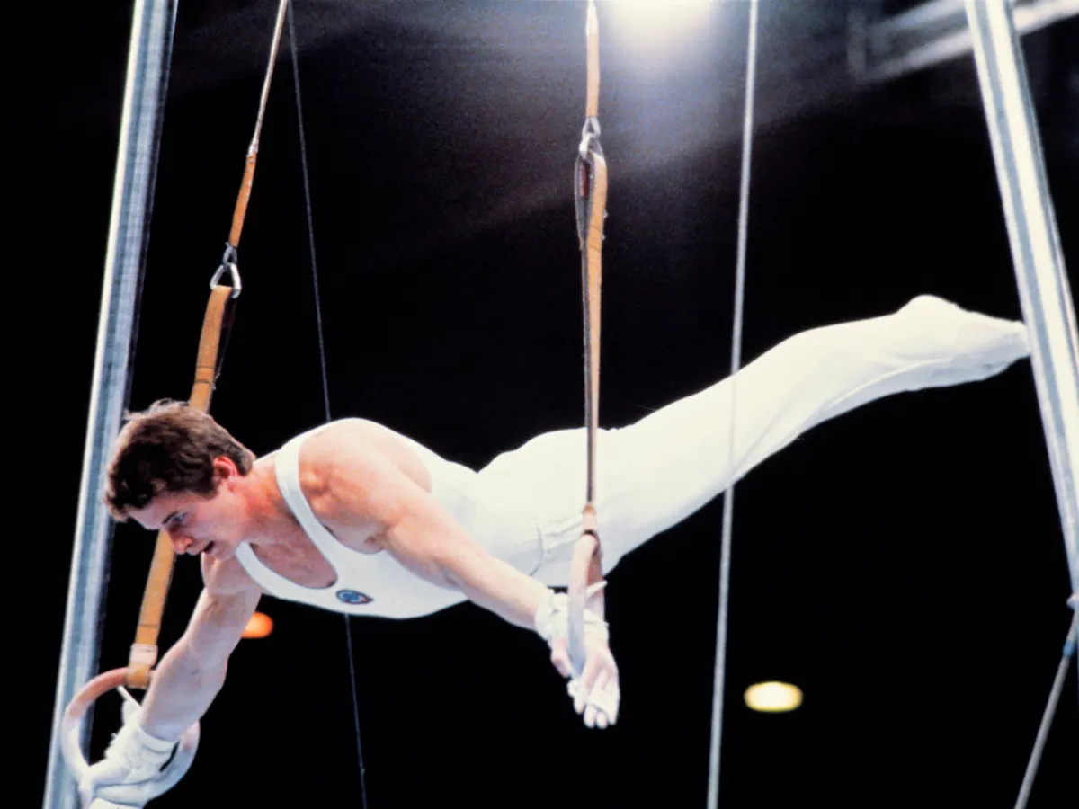Alexandr Dityatin from the Soviet Union performs his routine on the rings, 25 July 1980 during the Moscow Olympic Games. Dityatin won the gold medal and went on to finish the competition with a record of eight Olympic medals (3 gold, 4 silver, 1 bronze). AFP / EPU PHOTO (Photo by EPU/IOPP / AFP)