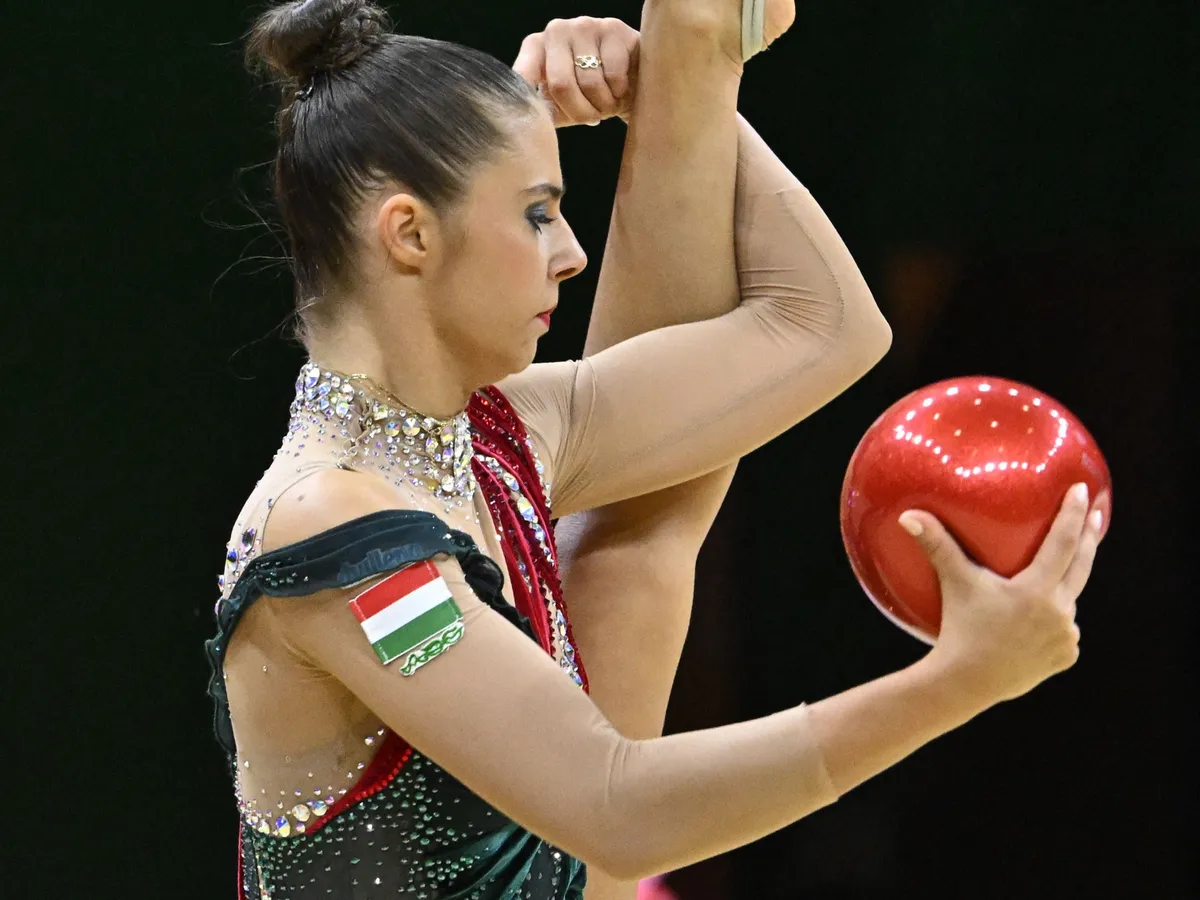 Silver medalist Hungary's Fanni Pigniczki competes during the ball apparatus individual final event of the 40th European Rhythmic Gymnastics Championships at the Arena in Budapest, Hungary on May 26, 2024. (Photo by Attila KISBENEDEK / AFP)