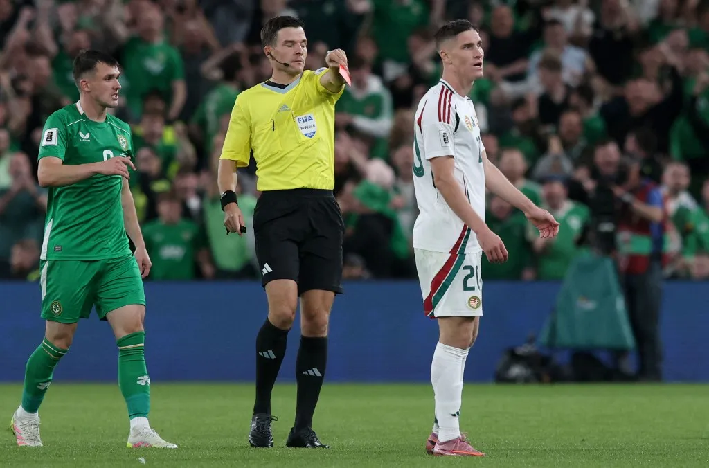 Hungary's midfielder #20 Roland Sallai is shown a red card during the 2026 World Cup Group F qualifier football match between Republic of Ireland and Hungary, at Aviva Stadium, in Dublin, on September 6, 2025. (Photo by Paul Faith / AFP) / NOT FOR MARKETING OR ADVERTISING USE / RESTRICTED TO EDITORIAL USE