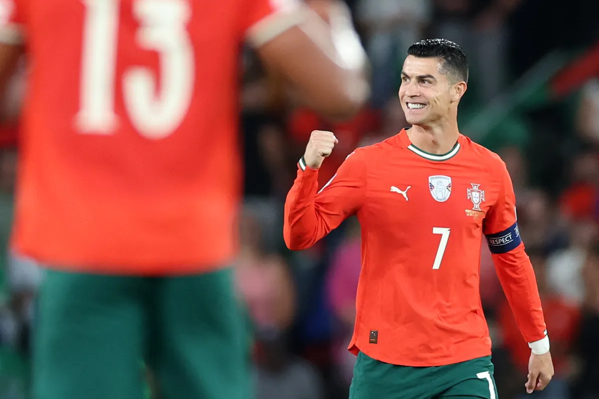 Portugal's forward #07 Cristiano Ronaldo celebrates after scoring the equalising goal during the 2026 World Cup qualifiers Europe zone group F football match between Portugal and Hungary at Jose Alvalade stadium in Lisbon on October 14, 2025. (Photo by PATRICIA DE MELO MOREIRA / AFP)