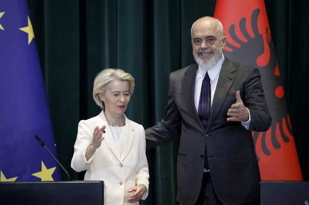Albania's Prime Minister Edi Rama (R) and European Commission President Ursula Von der Leyen gesture at the end of their joint press conference at the Government Headquarters in Tirana, on October 13, 2025. EU chief Ursula Von der Leyen arrived in Albania to attend the first EU-Western Balkans Investment Forum. (Photo by Adnan Beci / AFP)