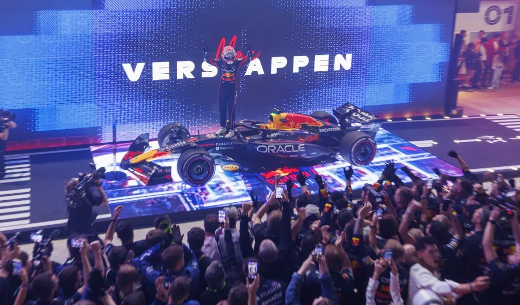 DOHA, QATAR - NOVEMBER 30: Max Verstappen of Red Bull poses for a photo on the podium after winning the Qatar Grand Prix, the 23rd round of the Formula 1 World Championship, at the Lusail International Circuit in Doha, Qatar on November 30, 2025. The Red Bull driver claimed his seventh victory of the season and the 70th win of his career. Mohammed Dabbous / Anadolu (Photo by Mohammed Dabbous / Anadolu via AFP)