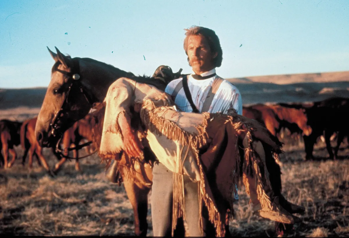 Kevin Costner, FILM TITLE:  DANCES WITH WOLVES.  DIRECTOR:  Kevin Costner.  STUDIO:  Columbia TriStar.  PLOT:  Having been sent to a remote outpost in the wilderness of the Dakota territory during the American Civil War, Lieutenant John Dunbar encounters, and is eventually accepted into, the local Sioux tribe. He is known as 'Dances with Wolves' to them and as time passes he becomes enamoured by the beautiful 'Stands With a Fist'. Not soon after, the frontier becomes the frontier no more, and as the army advances on the plains, John must make a decision that will not only affect him, but also the lives of the natives he now calls his people.PICTURED:  KEVIN COSTNER, MARY MCDONNELL.   Winner of 6 Academy Awards including Best Picture, Best Director.   (Credit Image: Â© Ă‚Â©Orion Pictures/Entertainment Pictures/ZUMAPRESS.com)