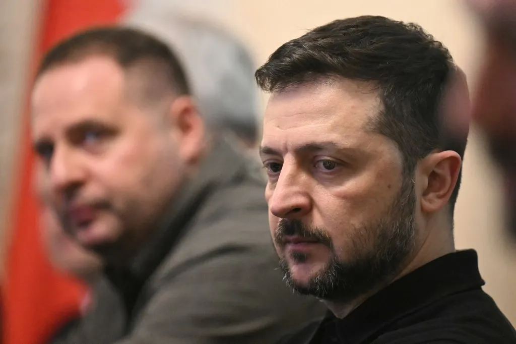 Head of the Office of the President of Ukraine Andriy Yermak (L) attends a meeting of Ukraine's President Volodymyr Zelensky (R) with the Polish President at Belweder Palace in Warsaw, Poland on January 15, 2025. (Photo by Sergei GAPON / AFP)