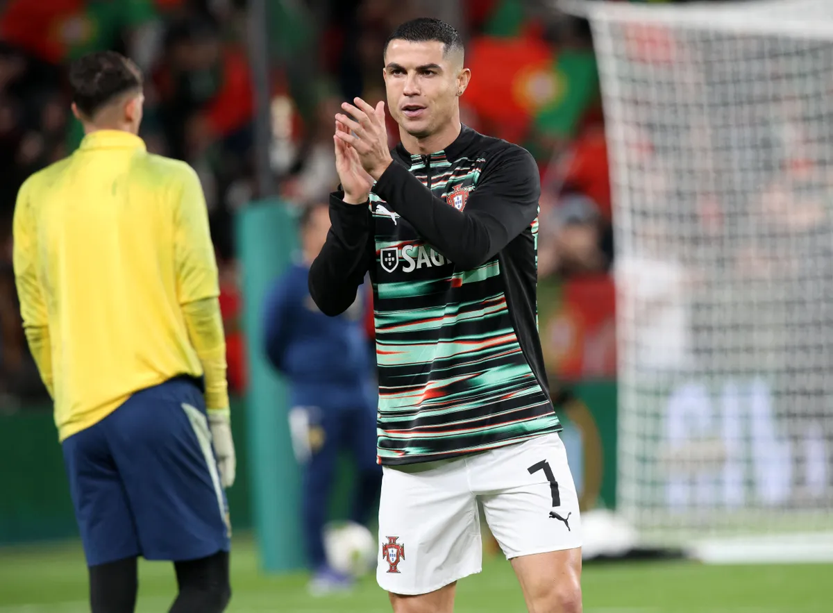Portugal's forward Cristiano Ronaldo warms up ahead of during the men's football 2026 World Cup Group F qualifier between Ireland and Portugal at Aviva Stadium in Dublin on November 13, 2025. (Photo by Paul Faith / AFP)