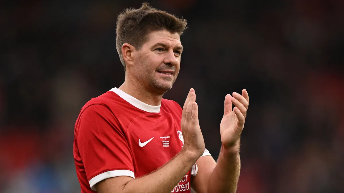 Liverpool Legends' midfielder Steven Gerrard applauds the fans following during the Legends football match between Liverpool Legends and Ajax Legends at Anfield in Liverpool, north-west England on March 23, 2024. (Photo by Oli SCARFF / AFP)