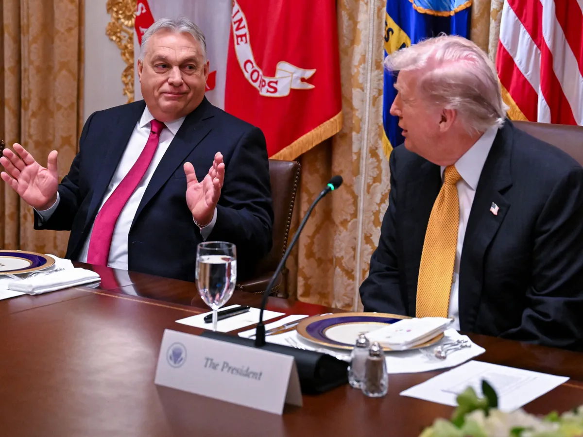 WASHINGTON, DC - NOVEMBER 7: Hungary Prime Minister Viktor Orban interacts with U.S President Donald Trump during a bilateral lunch in the Cabinet Room of the White House on November 7, 2025 in Washington, DC. Orbán and Trump are expected to address the continued reliance of Hungary on Russian oil, a resource seen as critical for funding Moscow's war.   Roberto Schmidt/Getty Images/AFP (Photo by ROBERTO SCHMIDT / GETTY IMAGES NORTH AMERICA / Getty Images via AFP) Orbán Viktor
