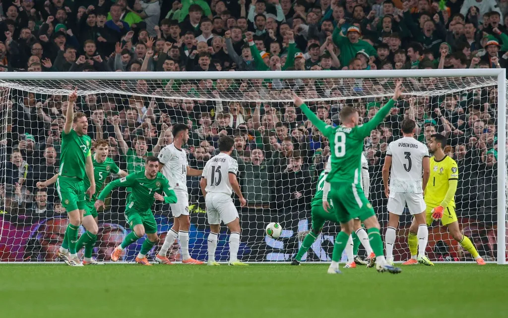 Republic of Ireland's striker Troy Parrott celebrates scoring the opening goal during the men's football 2026 World Cup Group F qualifier between Ireland and Portugal at Aviva Stadium in Dublin on November 13, 2025. (Photo by Paul Faith / AFP)