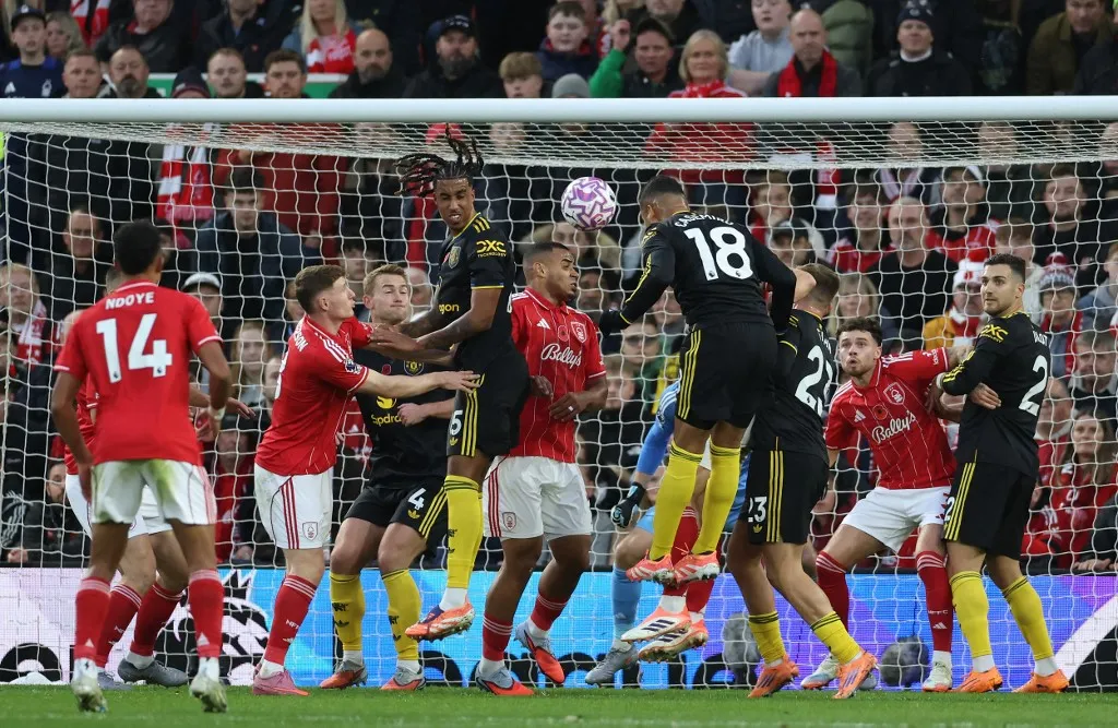 Manchester United's Brazilian midfielder #18 Casemiro headers the ball to score the opening goal during the English Premier League football match between Nottingham Forest and Manchester United at The City Ground in Nottingham, central England, on November 1, 2025. (Photo by Darren Staples / AFP) / RESTRICTED TO EDITORIAL USE. No use with unauthorized audio, video, data, fixture lists, club/league logos or 'live' services. Online in-match use limited to 120 images. An additional 40 images may be used in extra time. No video emulation. Social media in-match use limited to 120 images. An additional 40 images may be used in extra time. No use in betting publications, games or single club/league/player publications. /