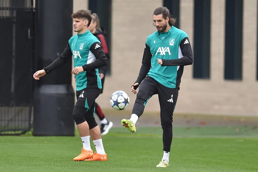 Liverpool's Hungarian defender #06 Milos Kerkez (L) and Liverpool's Hungarian midfielder #08 Dominik Szoboszlai (R) attend a training session at the team's training ground in Kirkby, north of Liverpool in north-west England, on November 3, 2025, on the eve of their UEFA Champions League league phase football match against Real Madrid.  (Photo by PETER POWELL / AFP)