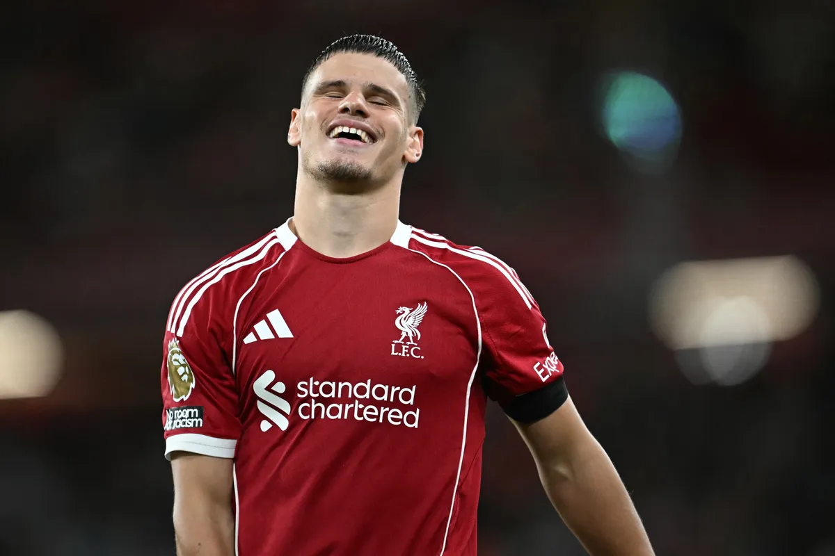 Liverpool's Hungarian defender #06 Milos Kerkez reacts during the English Premier League football match between Liverpool and Bournemouth at Anfield in Liverpool, north west England on August 15, 2025. (Photo by Paul ELLIS / AFP) / RESTRICTED TO EDITORIAL USE. No use with unauthorized audio, video, data, fixture lists, club/league logos or 'live' services. Online in-match use limited to 120 images. An additional 40 images may be used in extra time. No video emulation. Social media in-match use limited to 120 images. An additional 40 images may be used in extra time. No use in betting publications, games or single club/league/player publications. / 
