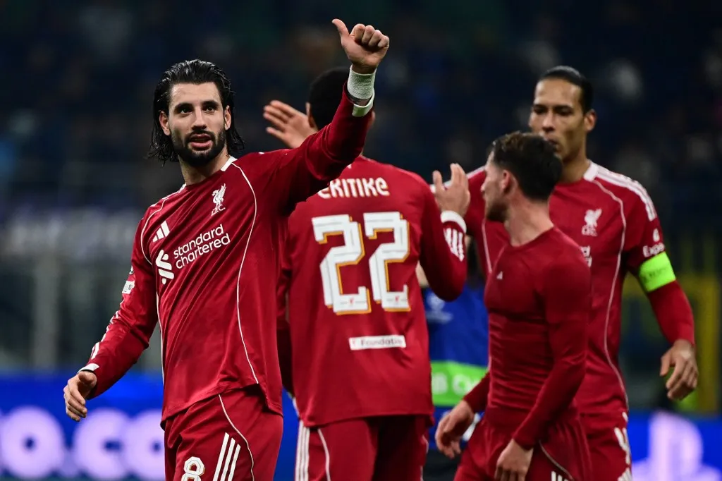 MILAN, ITALY - DECEMBER 9: Dominik Szoboszlai of Liverpool celebrates at the end of the UEFA Champions League football match Inter Milan vs Liverpool at San Siro Stadium in Milan, Italy on December 9, 2025 Piero Cruciatti / Anadolu (Photo by Piero Cruciatti / Anadolu via AFP)