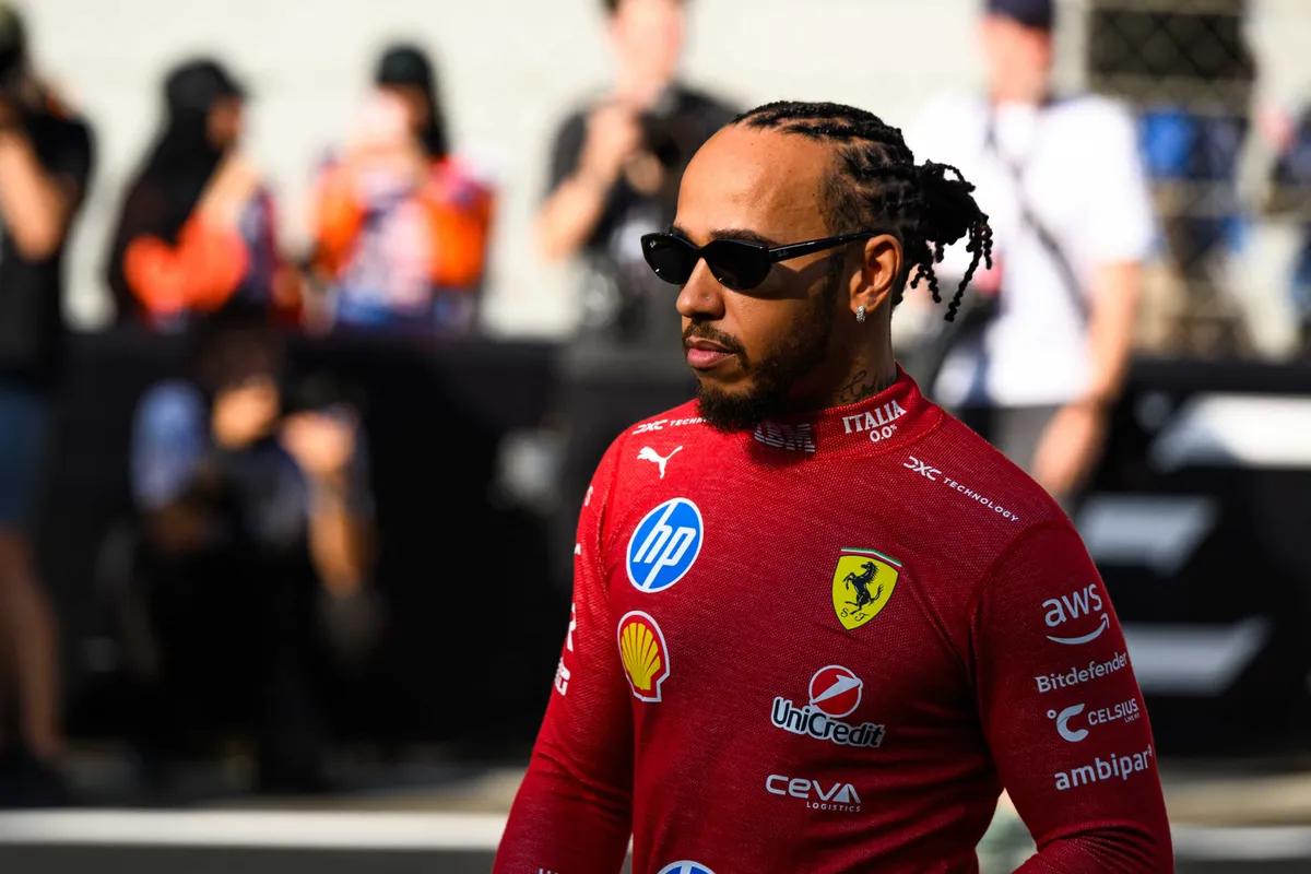 Lewis Hamilton of the Scuderia Ferrari HP F1 Team participates in Race Day on Yas Island, Abu Dhabi, on December 7, 2025. (Photo by Ahmad AlShehab/NurPhoto) (Photo by Ahmad AlShehab / NurPhoto via AFP)