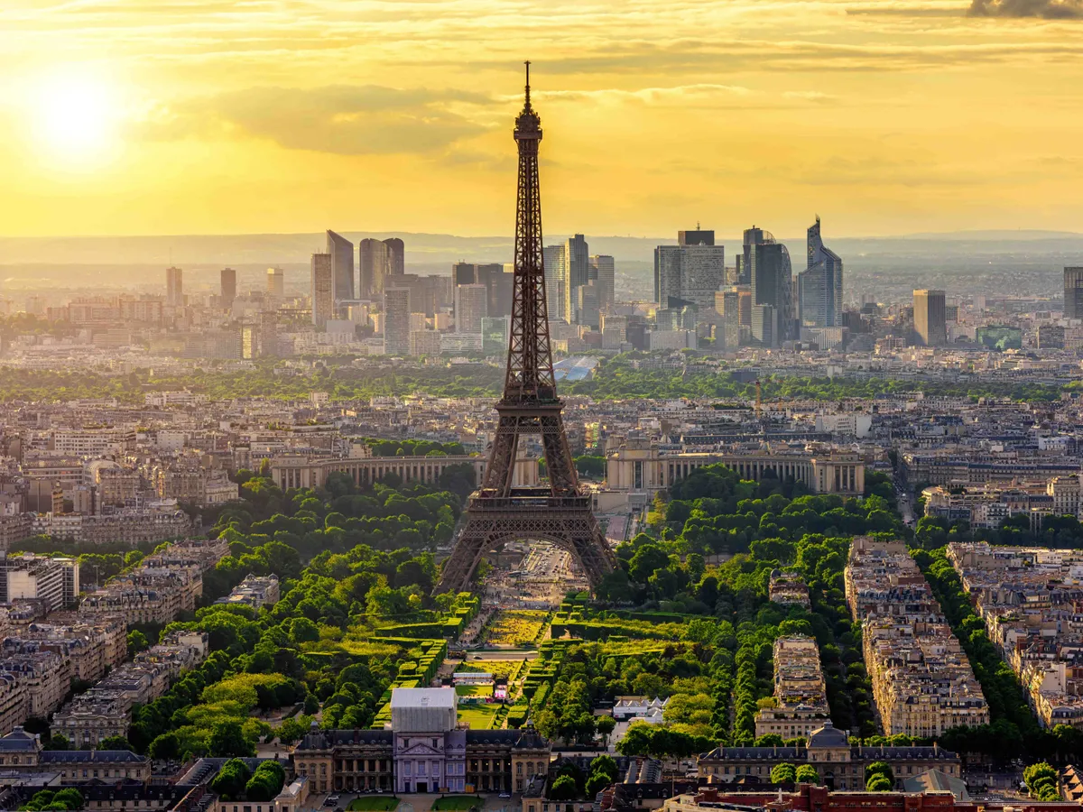 Skyline of Paris with Eiffel Tower at sunset in Paris, France. Architecture and landmarks of Paris. Postcard of Paris