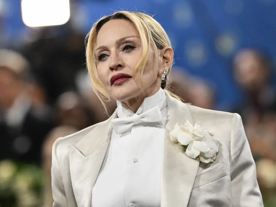 US singer songwriter Madonna arrives for the 2025 Met Gala at the Metropolitan Museum of Art on May 5, 2025, in New York. The Gala raises money for the Metropolitan Museum of Art's Costume Institute. The 2025 Met Gala is themed "Tailored for You," aligning with the Costume Institutes exhibition, "Superfine: Tailoring Black Style," set to open to the public on May 10. (Photo by Angela WEISS / AFP)