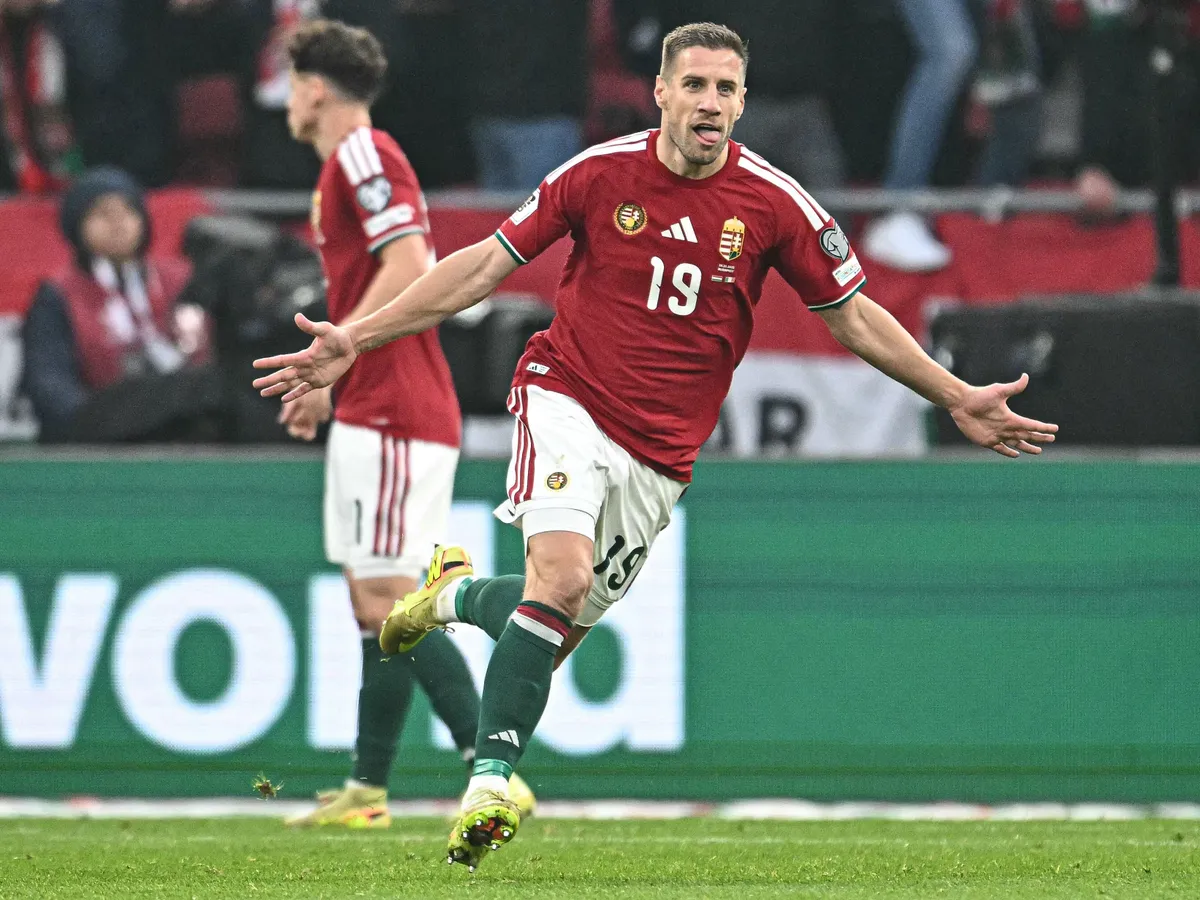 Hungary's forward #19 Barnabas Varga (C) celebrates his 2-1 during the FIFA World Cup 2026 Group F European qualification football match betweem Hungary and Republic of Ireland at the Puskas Arena in Budapest, Hungary on November 16, 2025. (Photo by Attila KISBENEDEK / AFP)