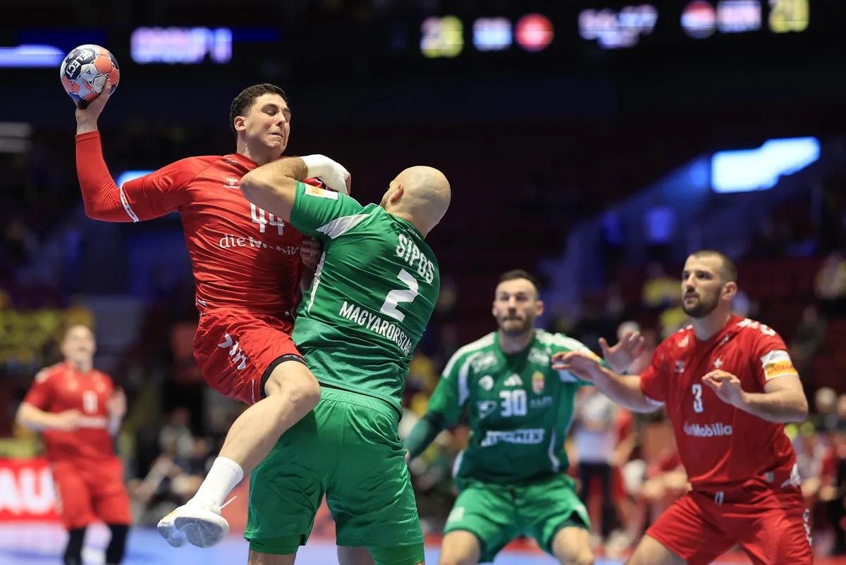 Switzerland's Mehdi Ben Romdhane and Hungary's Adrian Sipos in action during the 2026 EHF European Men's Handball Championship (the EHF Euro 2026) match between Switzerland and Hungary, at Malmo Arena in Malmo, Sweden, on January 23, 2026.
Photo: Andreas Hillergren / TT / Code 10600 (Photo by ANDREAS HILLERGREN / TT News Agency via AFP)