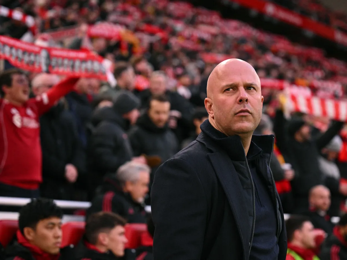 Liverpool's Dutch manager Arne Slot looks on ahead of the English Premier League football match between Liverpool and Burnley at Anfield in Liverpool, north west England on January 17, 2026. (Photo by Oli SCARFF / AFP) / RESTRICTED TO EDITORIAL USE. No use with unauthorized audio, video, data, fixture lists, club/league logos or 'live' services. Online in-match use limited to 120 images. An additional 40 images may be used in extra time. No video emulation. Social media in-match use limited to 120 images. An additional 40 images may be used in extra time. No use in betting publications, games or single club/league/player publications. / 
