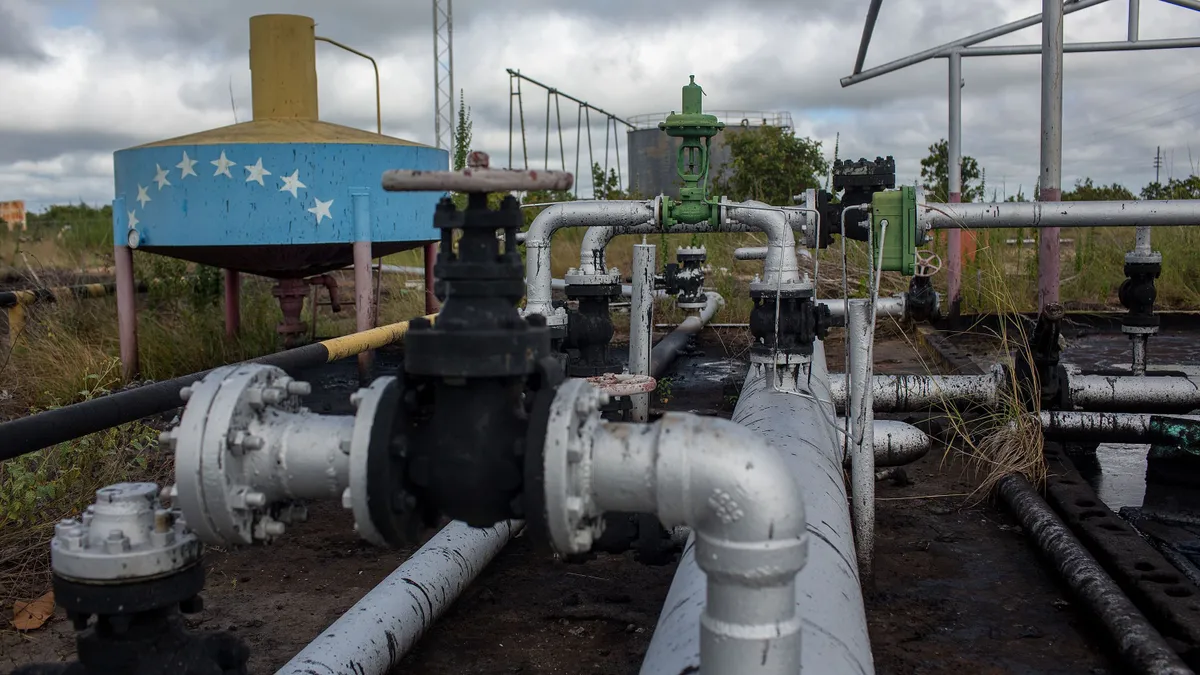 An abandoned PDVSA facility in the Melones oil field in El Tigre, Venezuela, on Friday, Oct. 15, 2021. State-owned Petroleos de Venezuela SA has been pumping about 908,000 barrels a day in the past week, but to reach that milestone they have resorted to desperate measures such as handing out contracts to little-known local companies with the promise of payments in scrap metal or backpacks stuffed with U.S. dollars, according to people with direct knowledge of the matter. Photographer: Manaure Quintero/Bloomberg via Getty Images